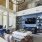 Resident lounge at our senior living community in San Antonio, featuring carpeted flooring and a flat screen TV.
