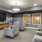 The theater room at our senior living community in San Antonio, TX, featuring carpeted flooring and a flat screen TV.
